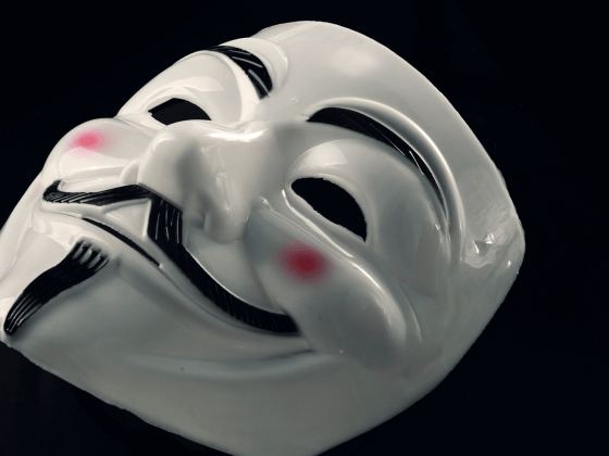 Anonymous mask on black background