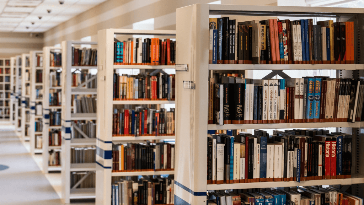 Shelves of books in a library.