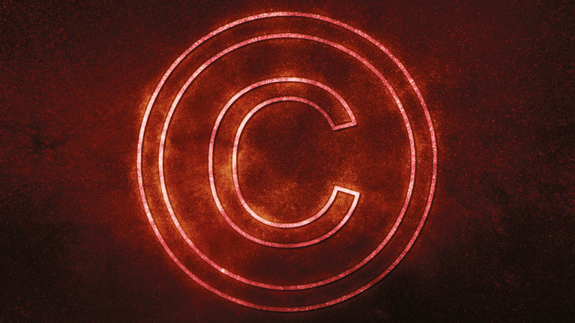 Red glowing copyright mark on dark background